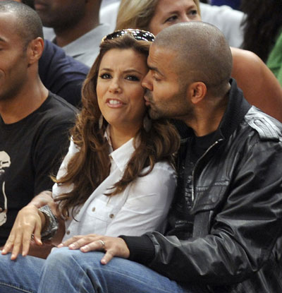 Eva Longoria and Tony Parker watch a basketball game between France and USA
