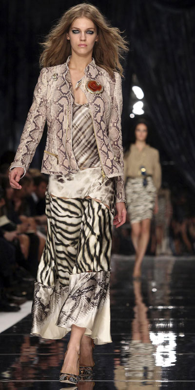 Models present Italian designer Roberto Cavalli's collections