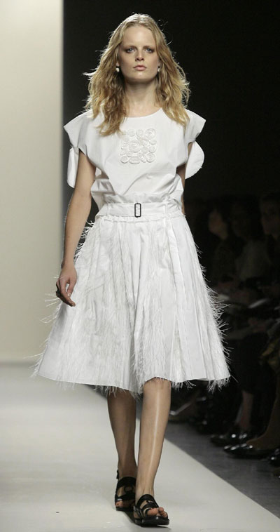 Models present crollections during Milan Fashion Week