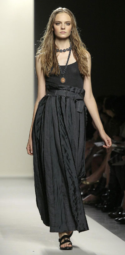 Models present crollections during Milan Fashion Week