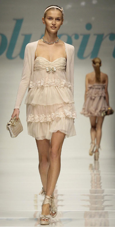 Models present collections during Milan Fashion Week
