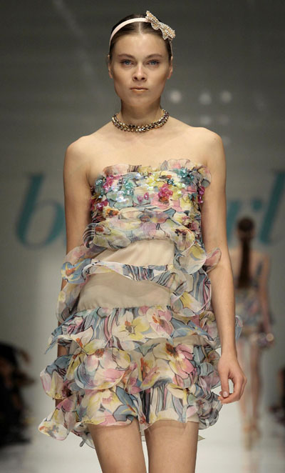 Models present collections during Milan Fashion Week