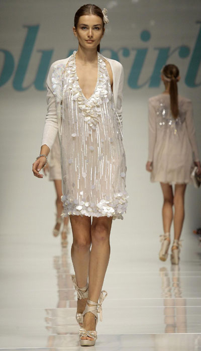Models present collections during Milan Fashion Week