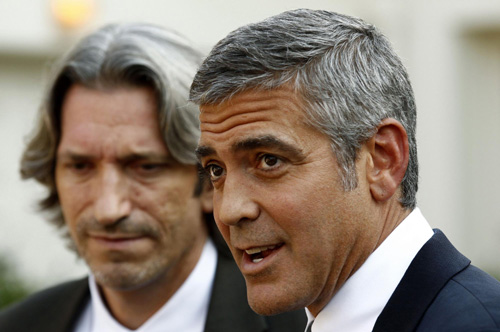 Actor George Clooney arrives for a meeting about Sudan