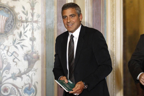Actor George Clooney arrives for a meeting about Sudan