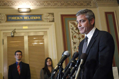 Actor George Clooney arrives for a meeting about Sudan