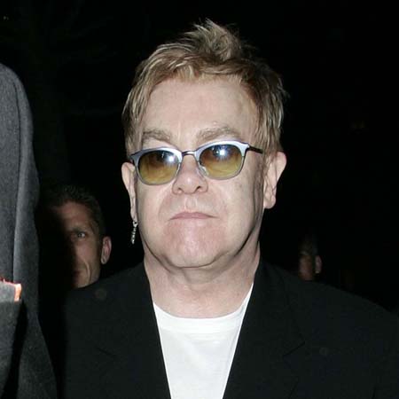 Elton John spiked to play piano
