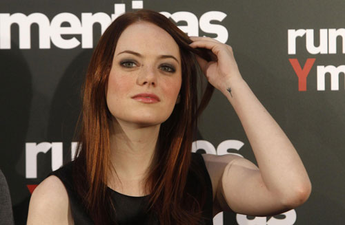 Emma Stone poses at a photocall for 'Easy A' in Madrid