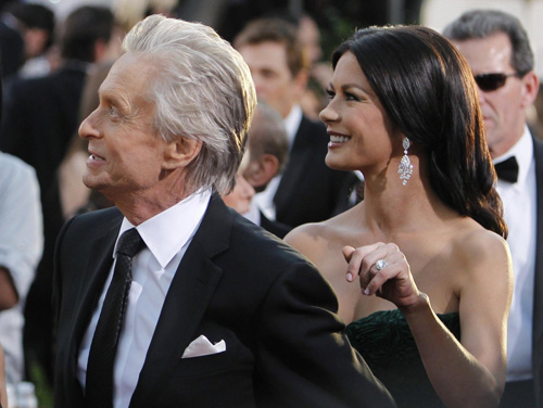 Catherine Zeta-Jones and Michael Douglas arrive at the 68th annual Golden Globe Awards