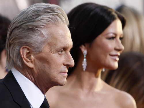 Catherine Zeta-Jones and Michael Douglas arrive at the 68th annual Golden Globe Awards