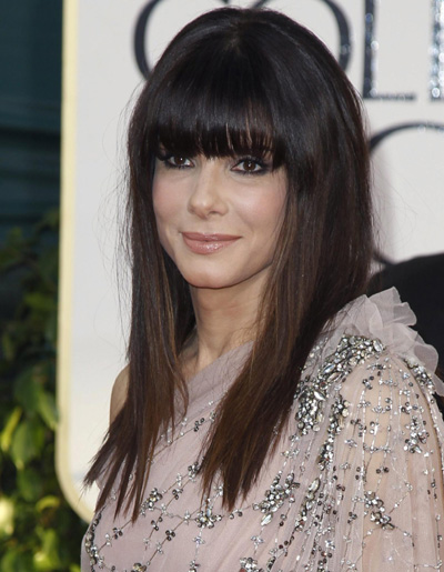 Sandra Bullock arrives at the 68th annual Golden Globe Awards