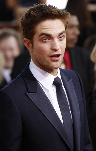 Robert Pattinson arrives at the 68th annual Golden Globe Awards