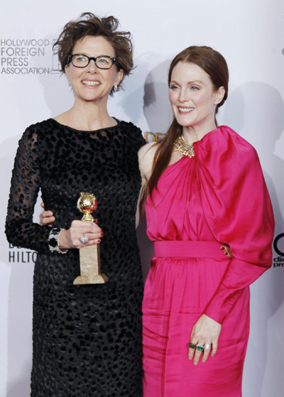 Annette Bening holds her award for Best Performance by an Actress