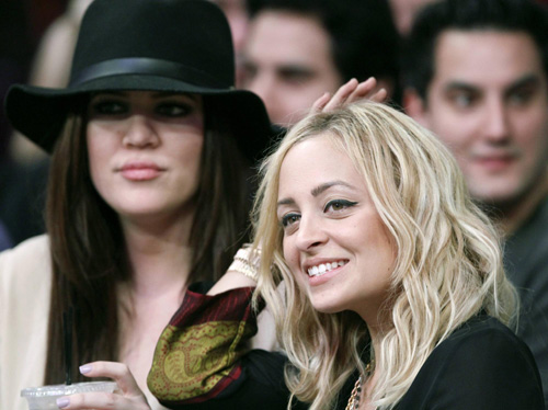 Nicole Richie and Khloe Kardashian watch NBA basketball game