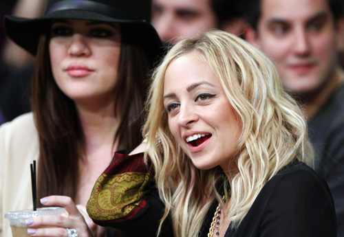 Nicole Richie and Khloe Kardashian watch NBA basketball game