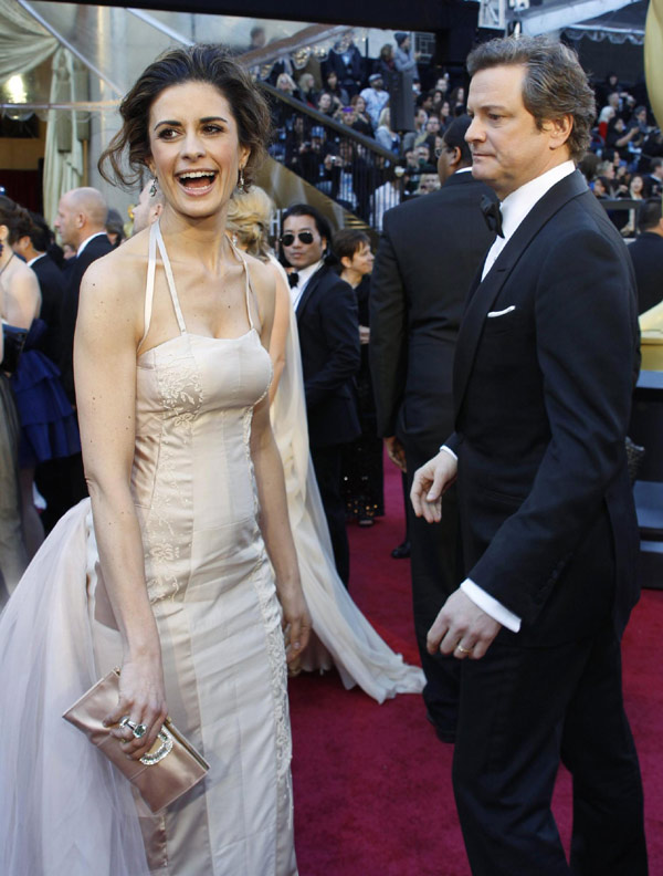 Colin Firth and his wife present at the 83rd Academy Awards