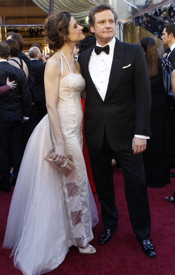 Colin Firth and his wife present at the 83rd Academy Awards