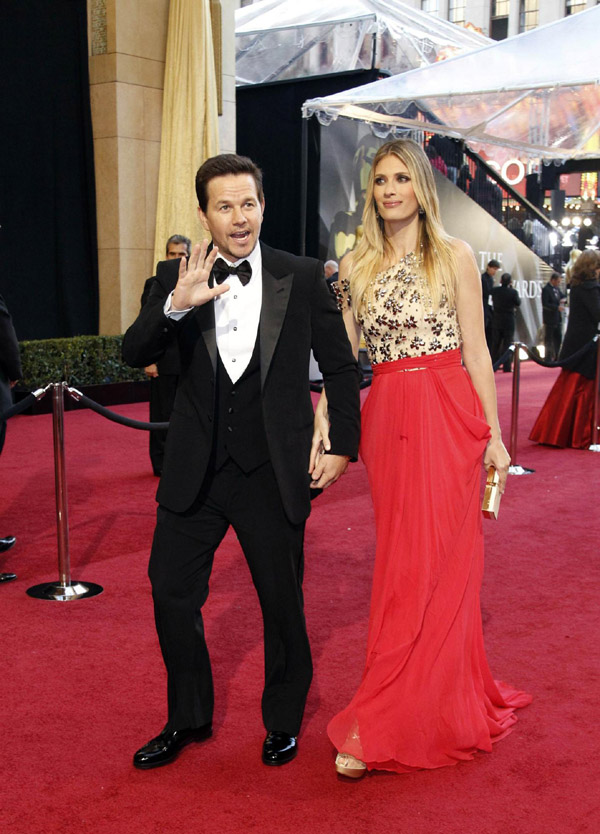 Mark Wahlberg arrives with his wife Rhea Durham at the 83rd Academy Awards in Hollywood