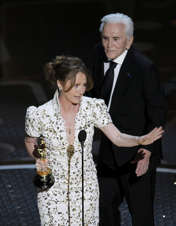 Melissa Leo accepts the Oscar for best supporting actress for her role in 