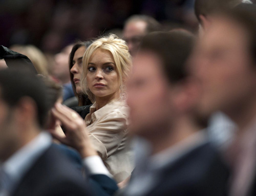 Lindsay Lohan watches NBA basketball game