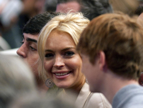 Lindsay Lohan watches NBA basketball game