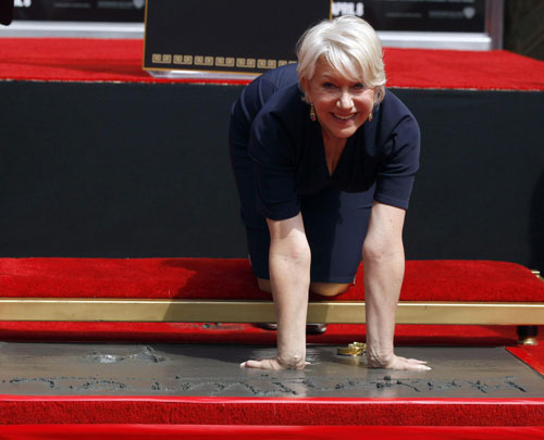 Helen Mirren makes hand and footprints in Hollywood