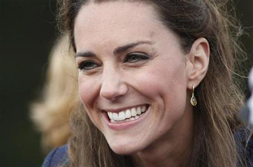 Kate's wedding dress designer named - again