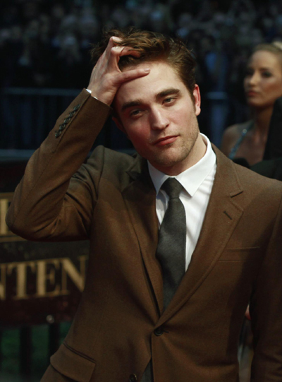 Robert Pattinson attends premiere of movie 