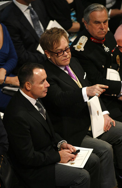 Elton John wells up at wedding