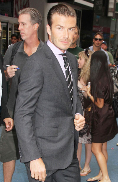 David Beckham admits daughter's dates 'interesting'