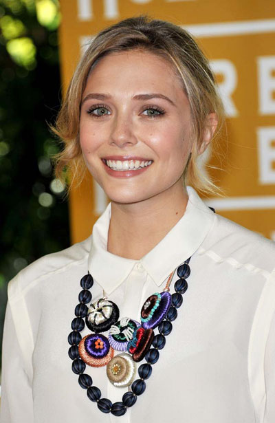Elizabeth Olsen told to forget fame