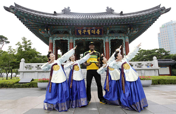Jamaica poses wearing traditional Hanbok in Daegu
