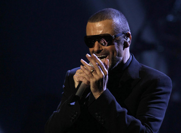George Michael returns to stage, announces split