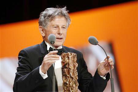 Polanski film cheered for wit, Winslet's vomit
