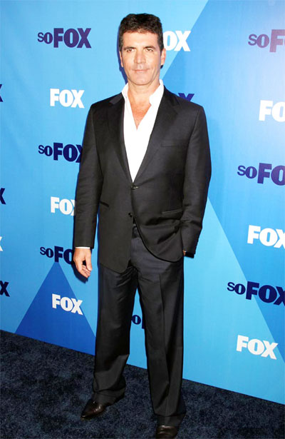 Cowell's 'bizarre' date with Denise