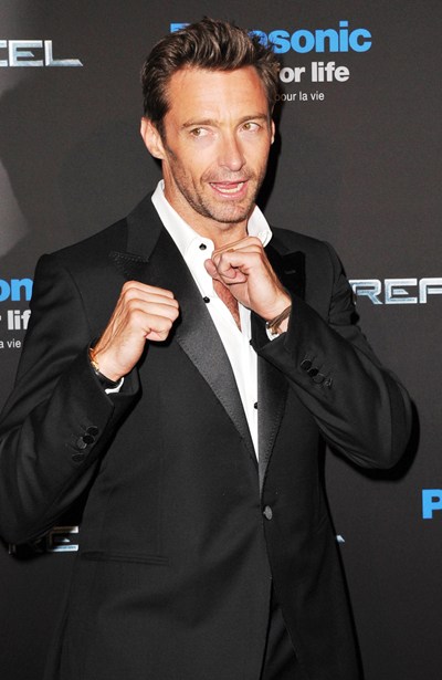 Hugh Jackman dresses as stockbroker