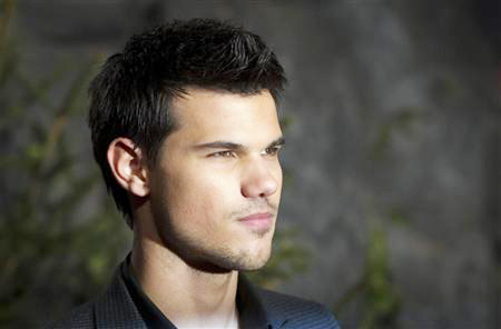 People says gay Taylor Lautner cover '100 perc