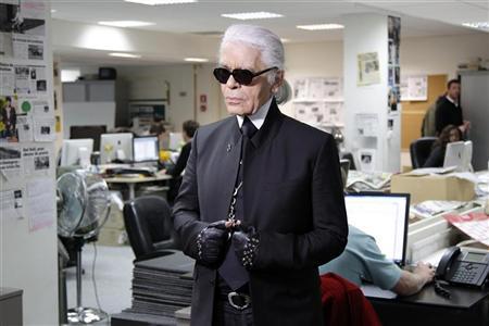 Lagerfeld makes nice with Adele