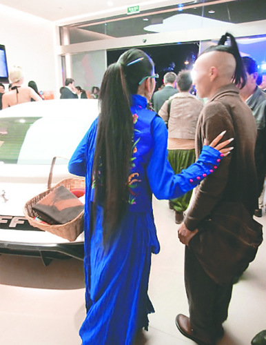 Dancer's national costume sparkles Ferarri auto show