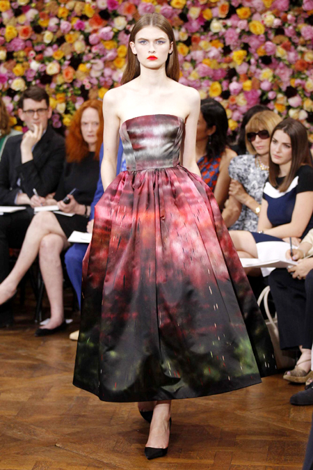 Raf Simons makes dazzling Dior debut with floral bounty