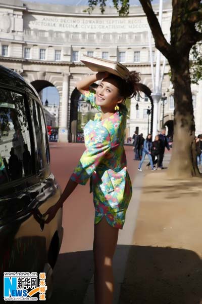 Actress Zhang Xinyi poses on London street