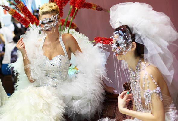 Wedding dresses shine on the carnival