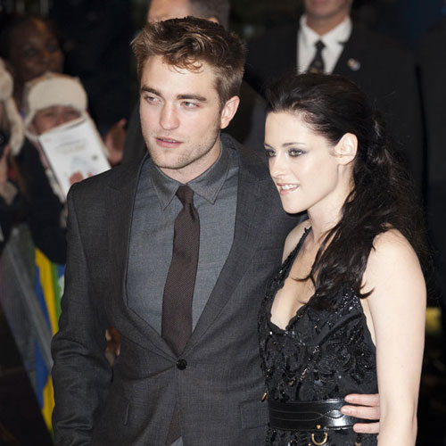 Pattinson and Stewart's poolside kisses
