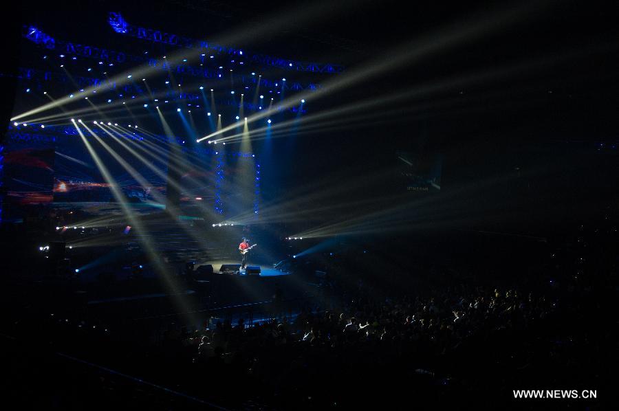 Singer Chyi Chin holds tour concert in Macao