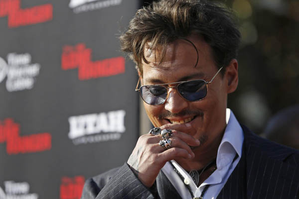 Depp attends premiere of 'The Long Ranger' in California