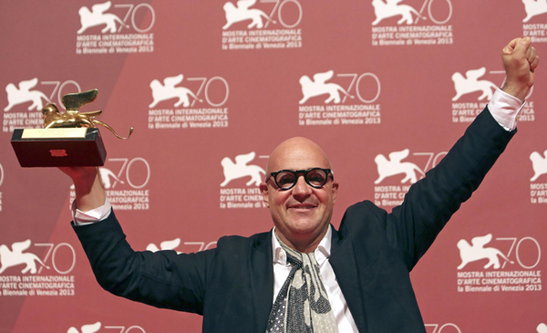 Italian director Gianfranco Rosi wins Golden Lion Award