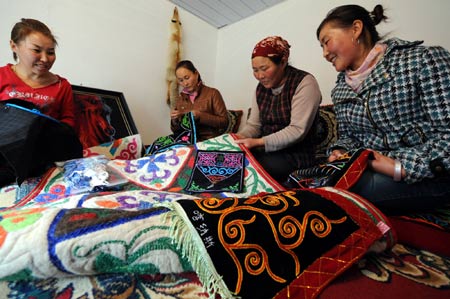Photos illustrate Xinjiang White Paper on on Development and Progress