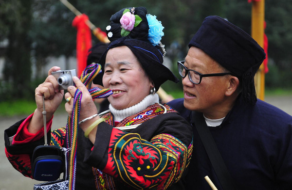 Ethnic Miao people celebrate Guzang Festival