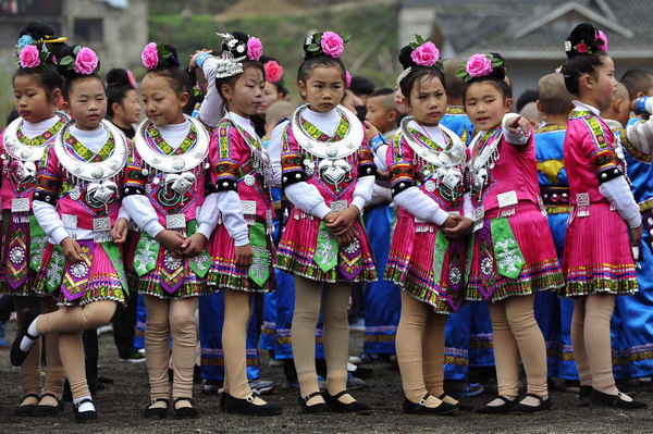 Ethnic Miao people celebrate Guzang Festival