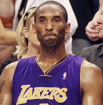 Los Angeles Lakers Kobe Bryant sits on the bench during a time out in the final minutes against the Phoenix Suns in Game Seven of their NBA Western Conference Playoff series. The Suns defeated the Lakers 121-90 advancing to the second round and will play the Los Angeles Clippers beginning May 8 in Phoenix.